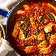 Looking for a meatless dish that's simple to put together? Choose this easy, one-pan recipe! Spinach with Tomato Sauce and Cheese is perfect for a warming and hearty meal!